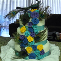 Peacock Wedding Cake Bride wanted to use her "peacock" as cake topper. Wedding at LA Arboretum with reception at Peacock Cafe.