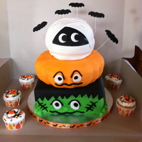 Halloween Bday Cake Loved making this cake with a ghost, pumpkin and frank....