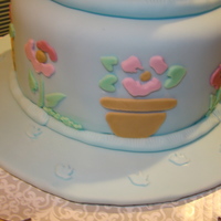 Garden Of Love 6 and 8 x 4 round cakes. Cake and decorations are fondant, with the exception of the bees and butterflies, (the bride had these in her...