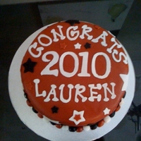 Kell Highschool Graduation Cake made for a high school graduate. 9" round covered in fondant with fondant accents to match the high school's colors.