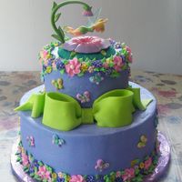 Tinkerbell Cake 2 tier 10", 6" all chocolate cake iced in buttercream with royal icing flowers. Thanks for looking!
