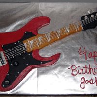 Electric Guitar This is my first carved guitar cake..carved from half sheet cake, Red Velvet with buttercream icing and fondant decorations. Thanks! :)