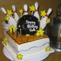 Bowling Fun! Bowling birthday cake inspired by our beloved Cake Girls. The ball is cake and the pins and stars are gumpaste. Thanks for looking