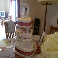 Heart Wedding Cake This cake was my first attempt at a wedding cakeit was a pretty personal cake i designed for my dad and his wife. i placed their image on...