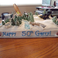 50Th Bday Cake 2 layer, chocolate fudge cake filled with fudge...topped with fondant,with fondant and gumpaste, and buttercream decorationsthis was a...