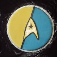 Star Trek Cake Made to order as a result of a charity slave auction! Vanilla sponge with raspberry jam and vanilla buttercream filling covered in fondant...