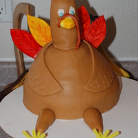 Gobble, Gobble made with wilton wonder mold pan, and rice krispie treats for his neck and head, covered in mmf fondant.