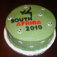 2010 World Cup Vanilla cake with raspberry filling. Buttercream icing with fondant accents.