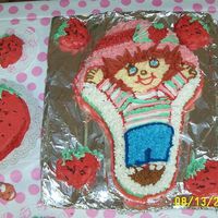 Strawberry Shortcake I made this cake for my daughter's 1st Birthday. I used the Dora pan and used heart cupcake pans for the little strawberries. The big...