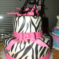 Pink Zebra This is my favorite zebra cake that I have done so far!! Fondant decor. The bow and spirals are gumpaste TFL