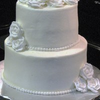 White Anniversary 35th wedding anniversary cake...buttercream with fondant pearls and royal icing roses dusted with pearl shimmer