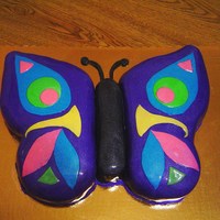 Butterfly I used a 1/2 sheet cake pan, and cut the design out of paper first. Marble cake covered with fondant. I also brushed it with edible pearl...