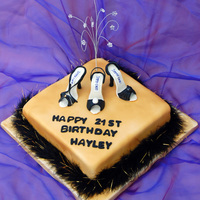 Sugarpaste Shoes 007 Themed birthday cake. Made for a customer with a Black and Gold party theme