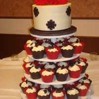 Black And Red Cupcake Tower This is 50 cupcakes, 1/2 chocolate 1/2 yellow butter cake iced in BC with fondant leaves. Cupcake Wrapture wrappers were gorgeous. Top tier...