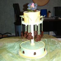 Babyshower The cake was a yellow cake with buttercream filling and buttercream icing as well. The bears I molded out of chocolate.