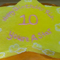 You're A Star birthday cake with brushed flowers along the sides