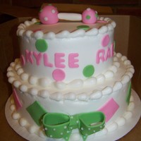 Baby Girl Rattle Baby Shower Cake Buttercream Icing. Decorations are made of gumpaste and fondant.