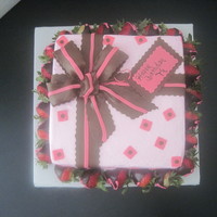 The Pink And Brown Present With Strawberries. 