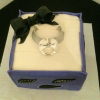 The Ring In A Box Cake This cake is another idea I got here from CC. The "diamond" is a paper weight I got from Hobby Lobby. The box is decorated in...