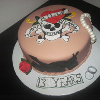 The Ed Hardy Anniversary Cake This cake was for 2 Ed Hardy lovers. He likes motorcycles and she like jewlery. TFL.