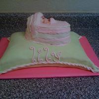 Baby Shower Pillow Cake This is my first pillow cake. I was pleased with it. This is a butter cake with chocolate buttercream frosting and strawberry glaze filling...