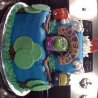 Chugginton Bday Cake This cake was for a 4 year olds bday. He really wanted a tunnel he could see all the way through. Its a vanilla cake with buttercream...