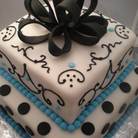 Black, White And Pale Blue Bridal Shower Vanilla cake with lemon buttercream. Covered in fondant with fondant accents.