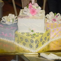 Presents For The Birthday Girl Buttercreme cakes with handmade gumpaste bows and flowers