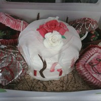 Valentines Day 2011 First real attempt at cake decorating!!!!!!!!! Strawberry laced vanilla cake with strawberry cream cheese frosting. All decorations were...