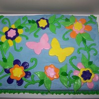 Butterflies And Flowers white sheet cake with mmf flowers and butterflies.