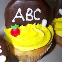 Teacher Apperication Cupcakes a small token of my apperication to the 6th grade teachers at my sons school. yellow cake cupcakes with buttercream icing. "blackboard...
