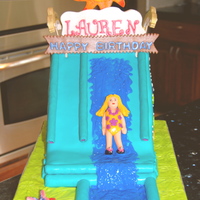 Water Slide Cake Customer asked to make the cake matching the slide they were renting for the party.French Vanilla pound cake w/ choc ganache filling,...