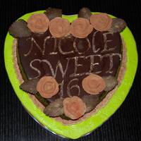 All Chocolate Cake Flourless chocolate w chocolate buttercream roses and pipes chocolate letters and leaves.