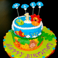 1St Birthday Cake Cake is covered in fondant wgumpaste and fondant details