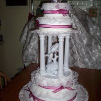 Ribbons And Lace This was a very easy cake to do. There is very little icing technique involved, because the lace and ribbon really make the cake.The bride...