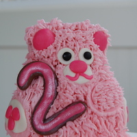 Pink Teddy Bear Cake Bear is made from the mini teddy bear pan and is sitting on a 10" square. All strawberry cake. Bear is iced in strawberry buttercream...