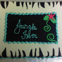 Jungle Cake This was my first attempt at a jungle/zebra cake. I will try it again on a round. It was buttercream with fondant accents. Thanks.