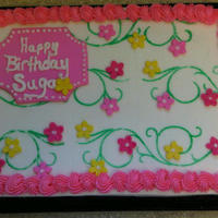 Flower Sheet Cake. I made this sheet for my niece. It's yellow butter cake with almond-vanilla butter cream icing with fondant embellishments.