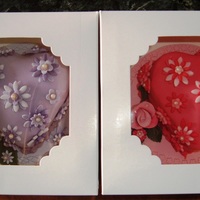 Mother's Day Cakes Vanilla sponge with buttercream filling and sugarpaste flowers etc. Purple for son's partner's mother and pink for sister-in-law...