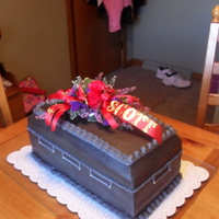 40Th Birthday This is my first casket cake. Had the local florist make me up a mini casket spray with 40 and the name of the Birthday Boy. Buttercreme...
