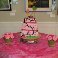 Birds And Nest Baby Shower Three tiered cake (top tier is styrofoam) with 2 cupcake bouquets. Cake was for a "co-ed" baby shower