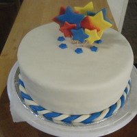 Cake For A Friend Cake I made for a friend's birthday. First time doing the twirly thing with fondant. The stars are made of fondant as well, done the...