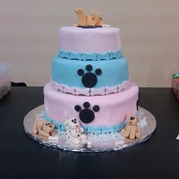 Puppy Theme Cake Three tier cake, covered in fondant for my niece's tenth birthday. The little dogs were made in advanced with fondant. Very fun to get...