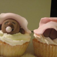 Choc. Cupcake Babies These are the cupcakes that go with the belly cake I made fo my frieds baby shower.