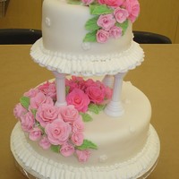 Two-Tier Fondant Rose Cake This was the Wilton Course 4 cake I think. Both cakes are lemon cake covered in fondant. The roses took me forever to make - it seemed like...