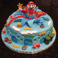 Supermario Land Cake This was a devil's food cake with Bunnywoman's chocolate buttercream filling, torted once only. The decorations are totally...