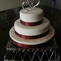 Anniversary Cake Two tier lemon cake with fondant. Very simple but much more difficult than I thougt to get the fondant super smooth