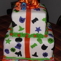Sister's Halloween Birthday Cake Cakes are 3 layers each, choclocate/almond/orange with buttercream filling. Covered and decorated with MMF.