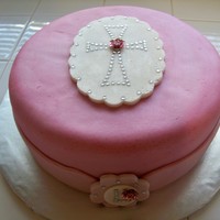 Lily's Dedication Cake 10" chocolate wasc cake with chocolate ganache and peanut butter cup filling. frosted with homemade buttercream, decorated with MMF....