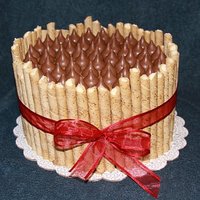 Barrel Cake 8" French vanilla with caramel icing, French Vanilla Pirouette cookies and caramel-filled Hershey Kisses.